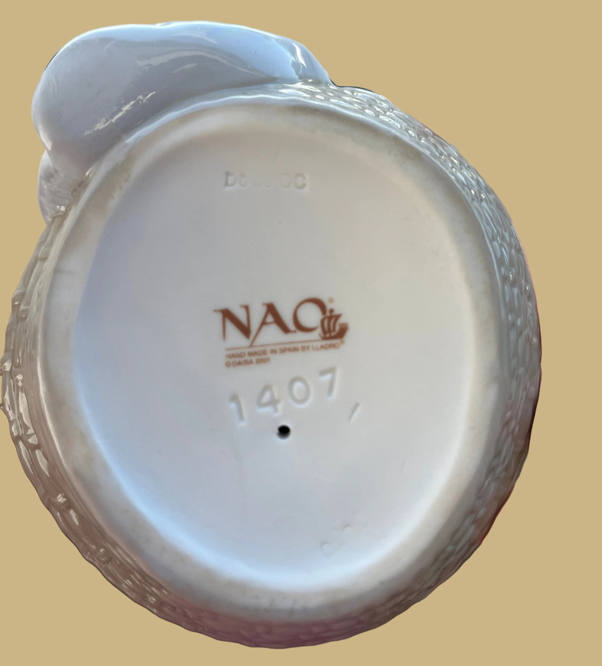 Nao by Lladro “Cat Napping in Basket”