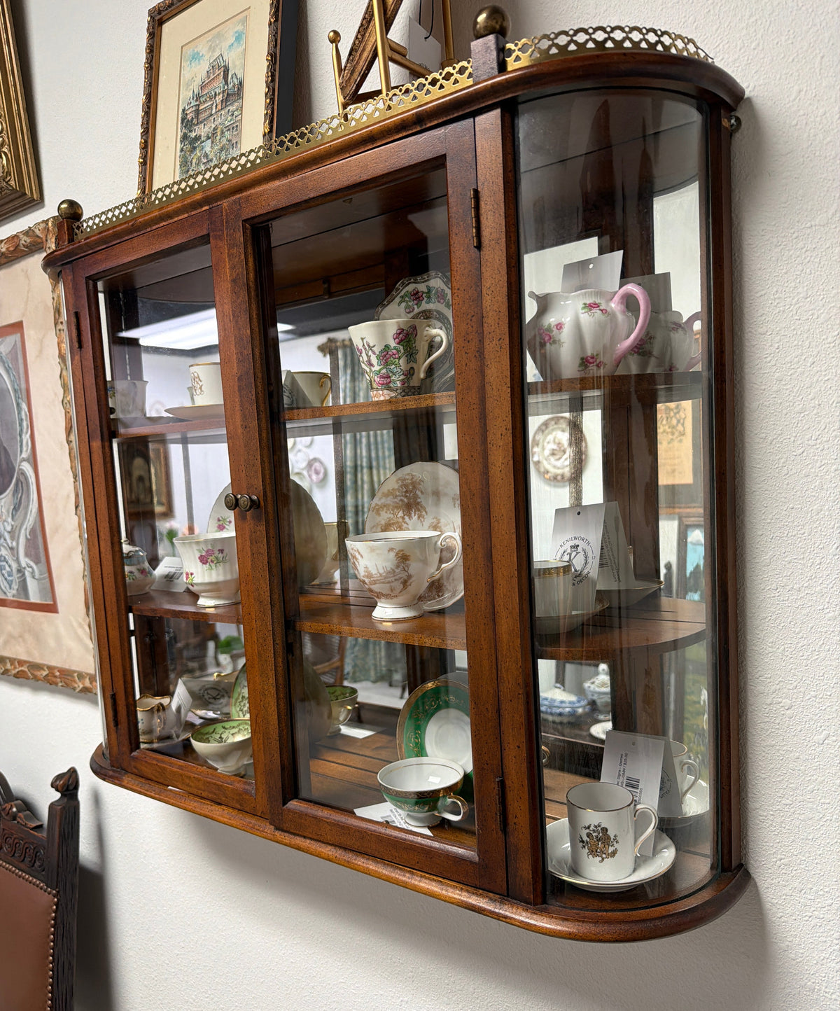 Wall-mounted Glads & Bronze Curio Cabinet