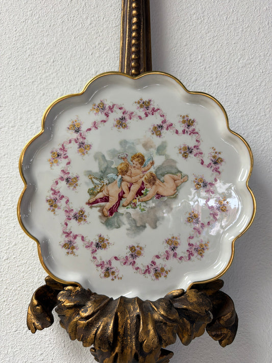 Antique French Limoges Porcelain Decorative Plate Featuring a Hand-Painted Cherub Scene