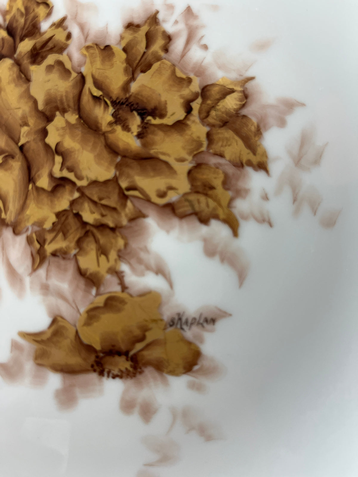 Artist-signed porcelain plate by Silvia Kaplan