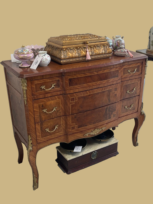 A Louis XV style marquetry Commode