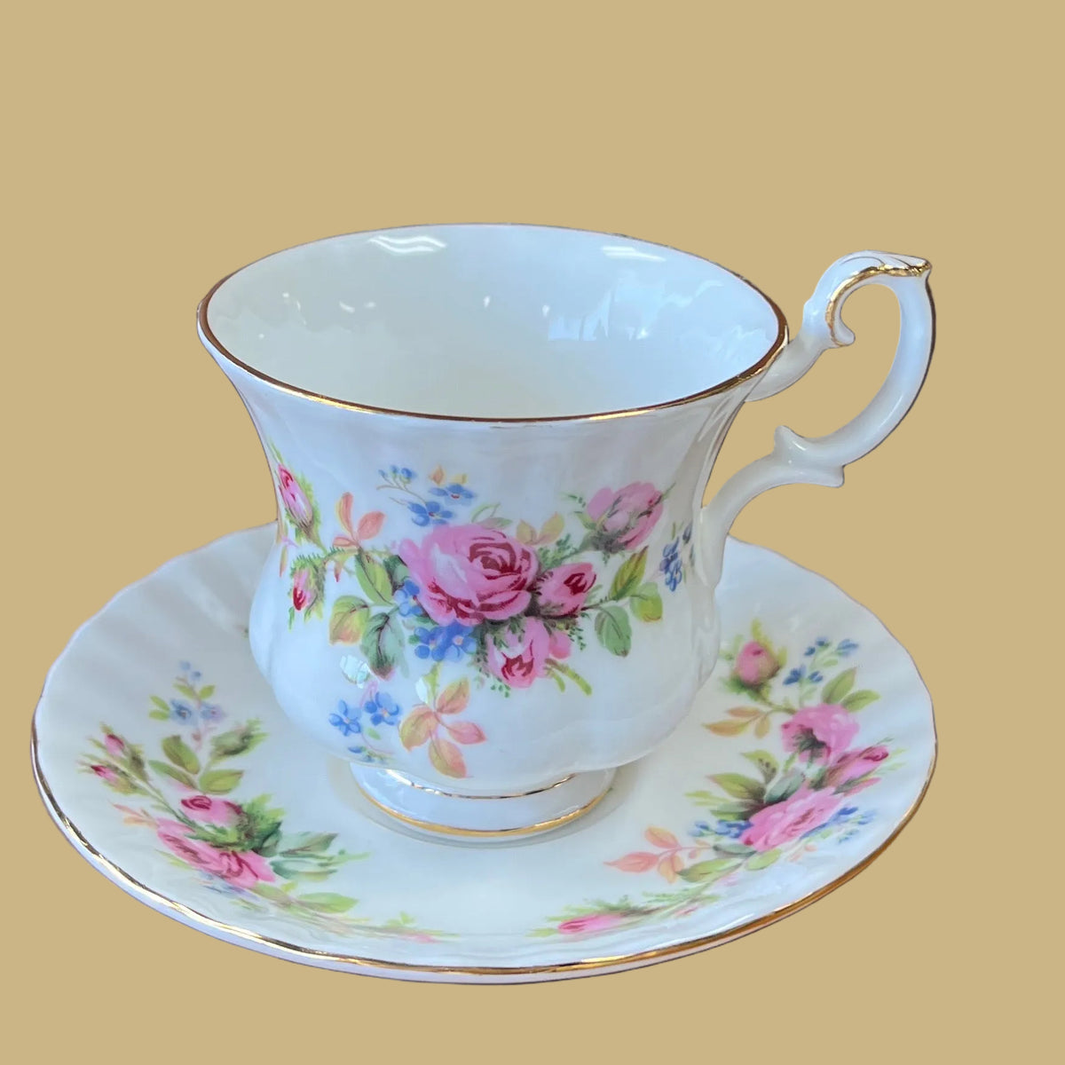 Royal Albert "Moss Rose" pattern teacup & saucer