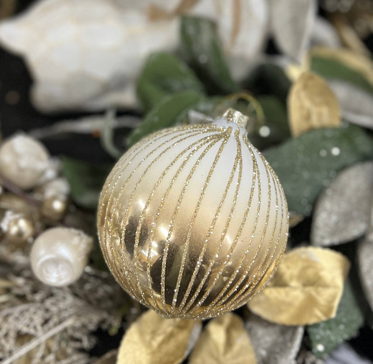 A Golden Kiss Ornament 3x3in